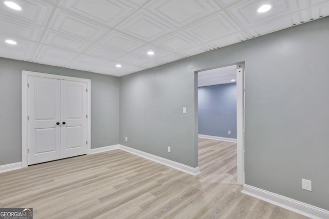 unfurnished room featuring light hardwood / wood-style floors