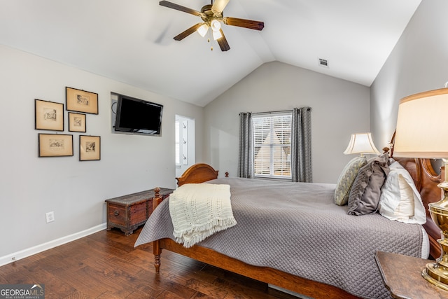 bedroom with lofted ceiling, dark hardwood / wood-style floors, and ceiling fan