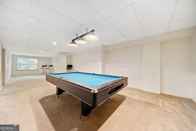 rec room featuring pool table, a paneled ceiling, and light carpet