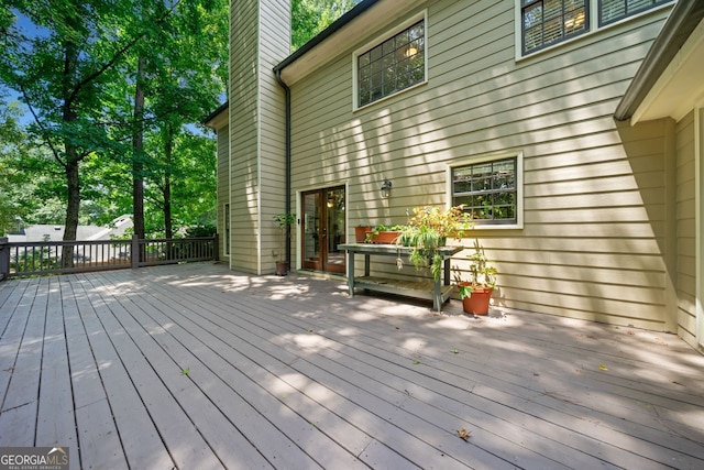 wooden terrace featuring french doors