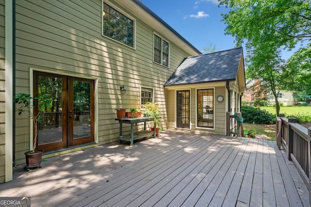 wooden terrace featuring french doors