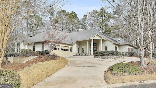 view of front of property featuring a garage