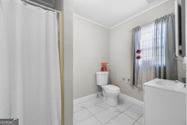 bathroom featuring vanity, crown molding, toilet, and walk in shower