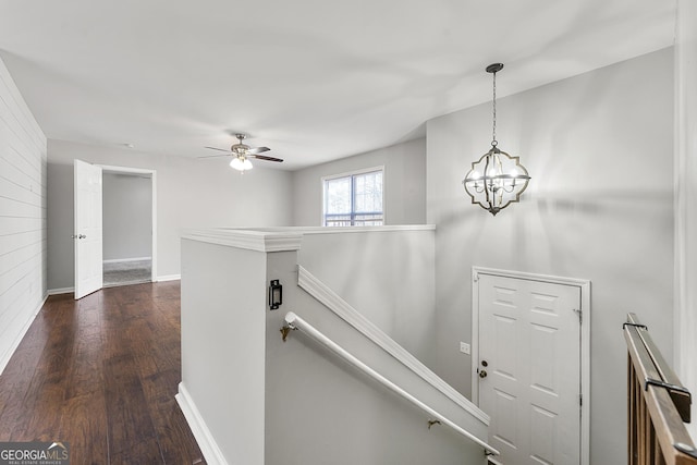 interior space with dark hardwood / wood-style floors and a chandelier