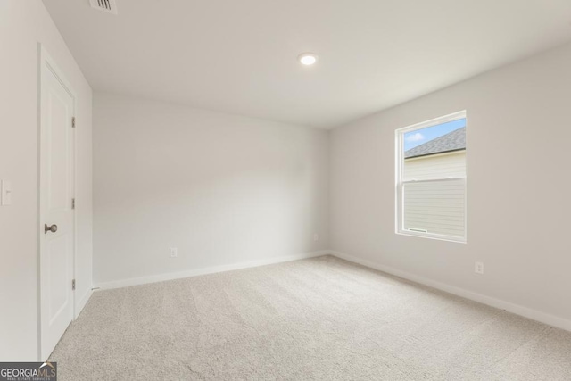 view of carpeted spare room