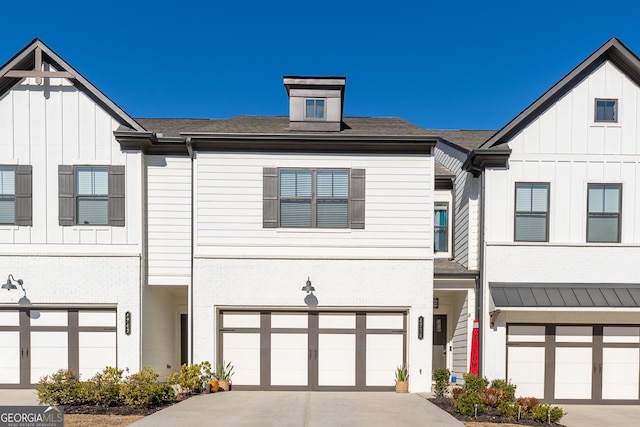 view of front of home with a garage