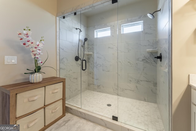 bathroom with vanity and walk in shower