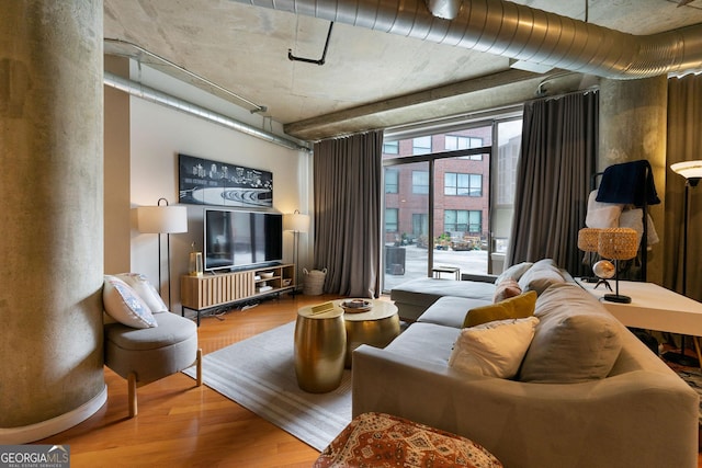 living room with hardwood / wood-style floors