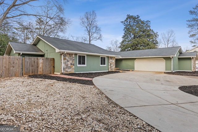 single story home featuring a garage