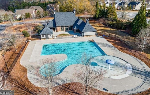 view of pool with a patio, fence, and a fenced in pool