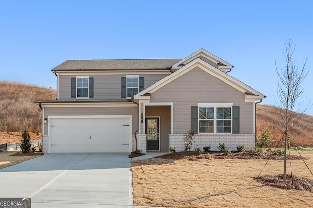 craftsman-style home with a garage