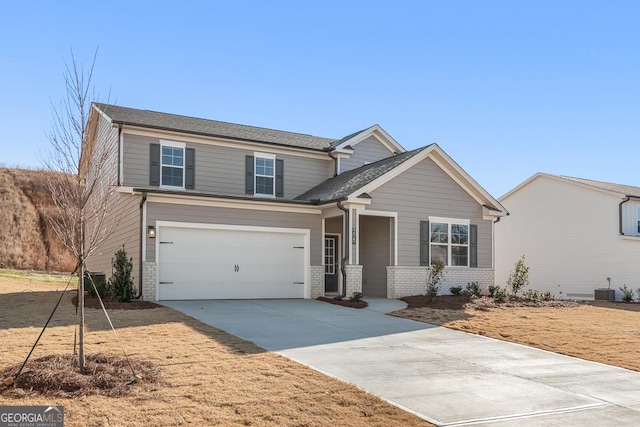 craftsman house with a garage