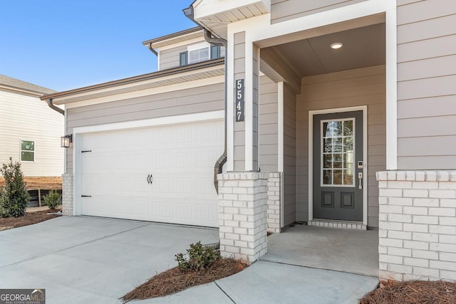 entrance to property featuring a garage