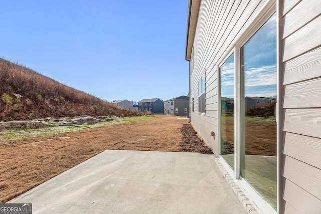 view of yard with a patio area