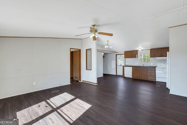 unfurnished living room featuring sink, dark wood-type flooring, vaulted ceiling, and ceiling fan