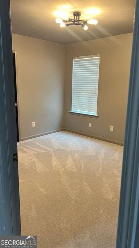 empty room with carpet floors