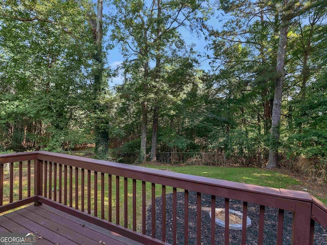 deck featuring a lawn