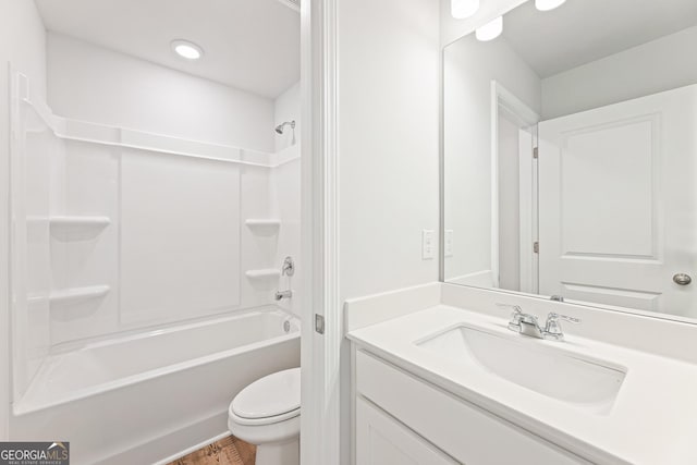 full bathroom featuring vanity, toilet, and shower / washtub combination