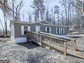 view of front of house with a deck