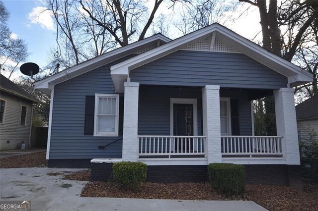 bungalow featuring covered porch