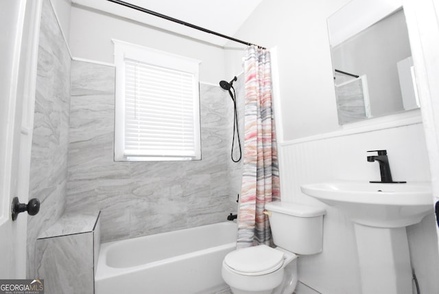 full bathroom featuring toilet, sink, and shower / bath combo