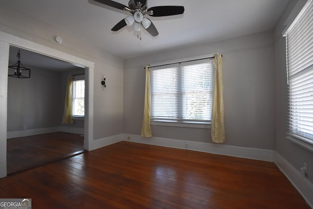 unfurnished room with wood-type flooring and ceiling fan