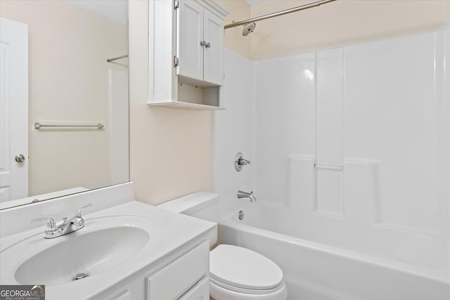 full bathroom with shower / tub combination, vanity, and toilet