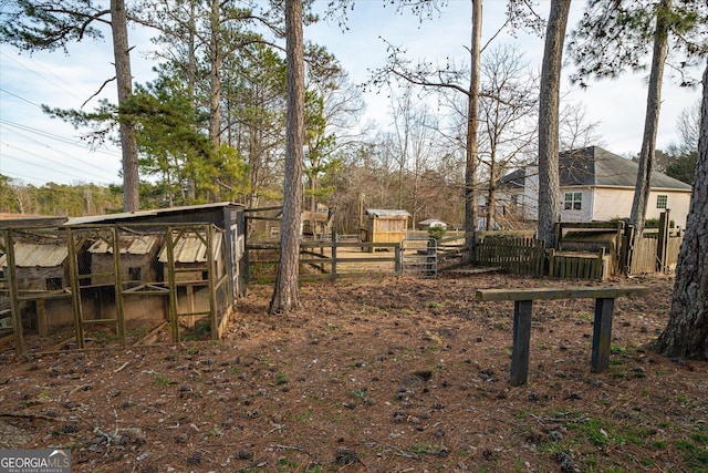 view of yard with an outdoor structure