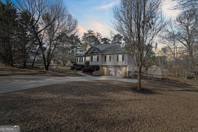 view of front of property with a garage