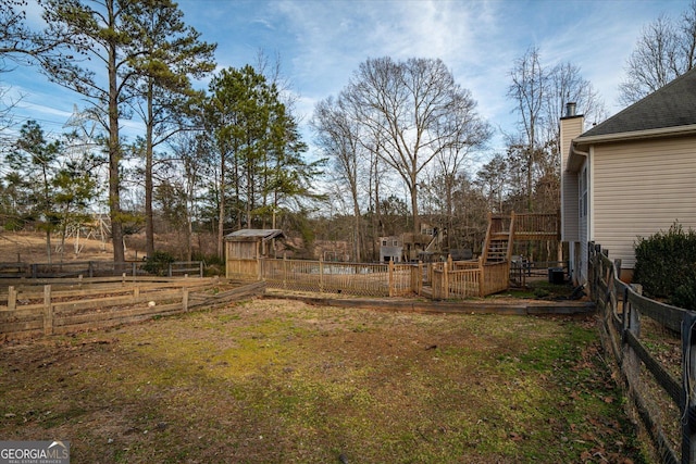 view of yard featuring a deck