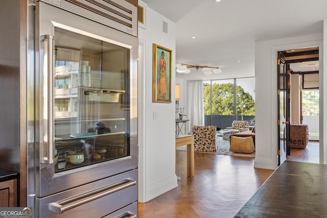 interior space with dark parquet flooring