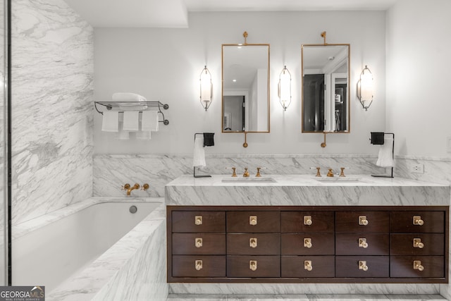 bathroom with a relaxing tiled tub and vanity