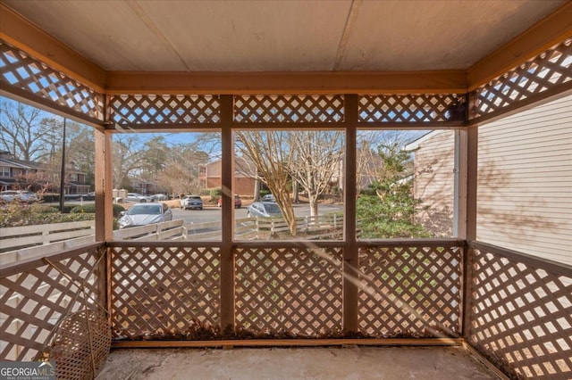 unfurnished sunroom featuring a healthy amount of sunlight