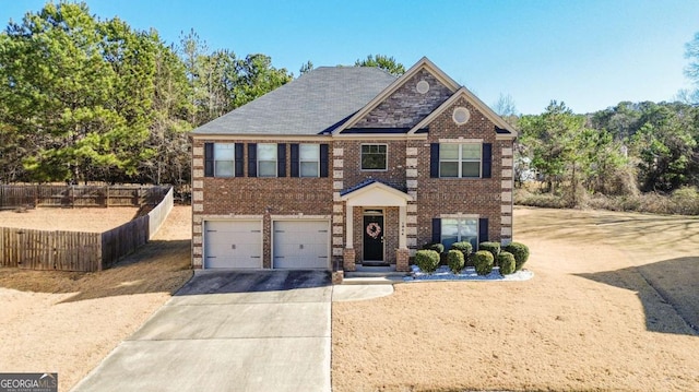 view of front of property with a garage