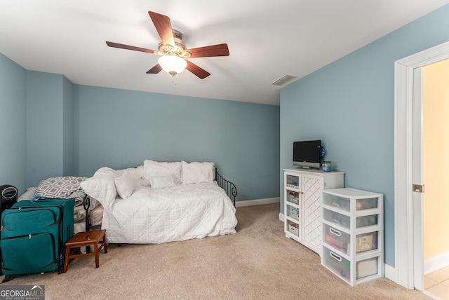 carpeted bedroom featuring ceiling fan