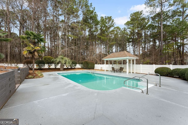 view of swimming pool with a gazebo and a patio