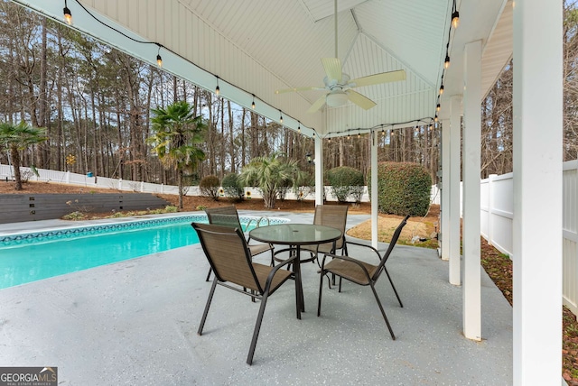 view of pool featuring a patio area and ceiling fan