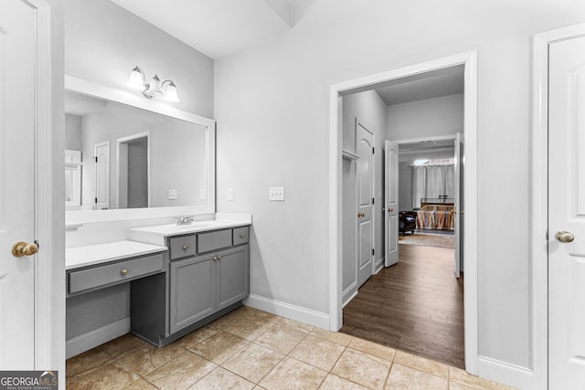 bathroom featuring vanity and tile patterned flooring