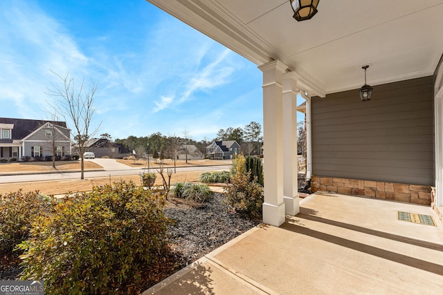 view of patio featuring a porch