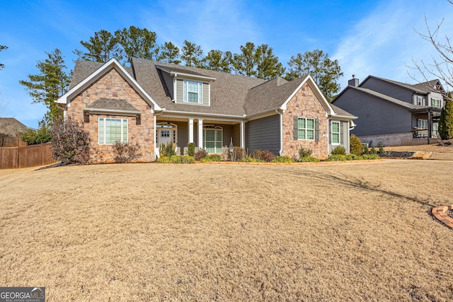 craftsman house featuring a front yard