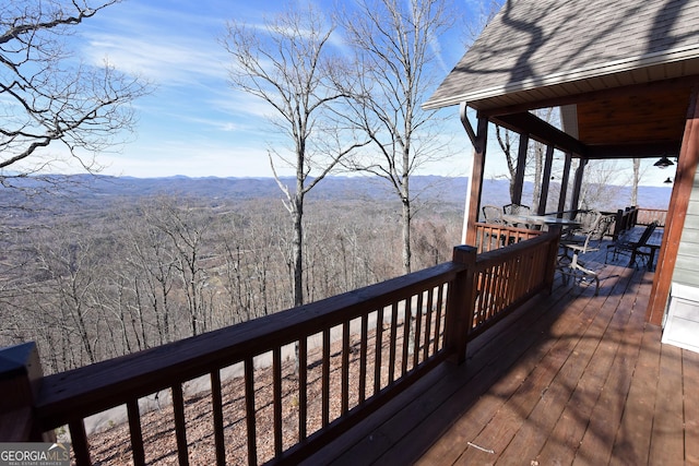 wooden terrace featuring a mountain view