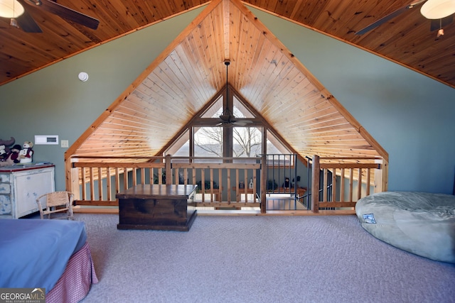 bedroom featuring lofted ceiling, wood ceiling, and carpet flooring