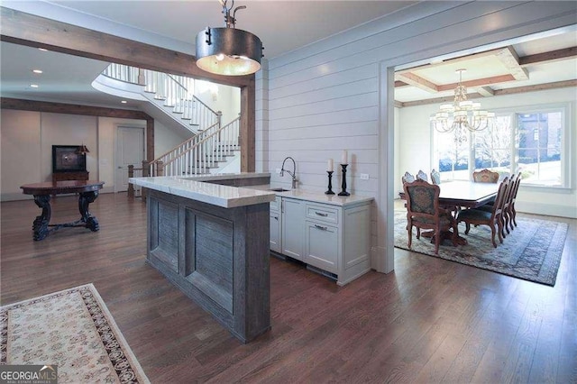 5152 Boulder Bluff Way, Suwanee, GA 30024 - kitchen with a chandelier, dark wood-style flooring, hanging light fixtures, ornamental molding, and recessed lighting