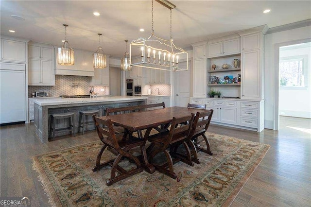 5152 Boulder Bluff Way, Suwanee, GA 30024 - dining space with recessed lighting, dark wood finished floors, a chandelier, and crown molding