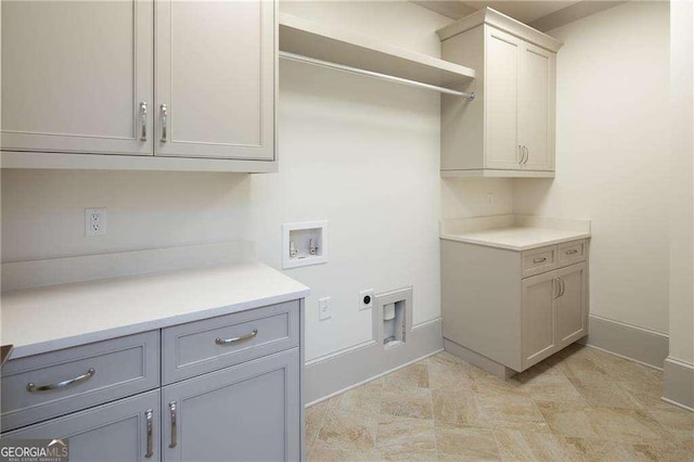 5152 Boulder Bluff Way, Suwanee, GA 30024 - laundry area with cabinet space, electric dryer hookup, and hookup for a washing machine