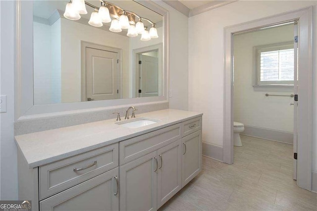 bathroom with vanity and toilet