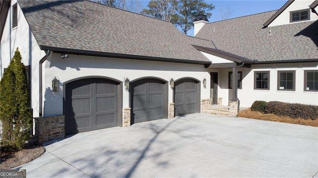 view of front of property featuring a garage