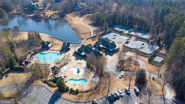 bird's eye view with a water view