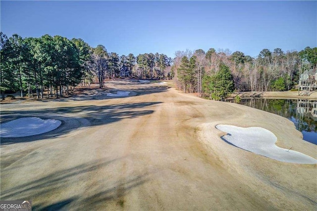 5152 Boulder Bluff Way, Suwanee, GA 30024 - view of dirt / gravel road featuring view of scattered trees