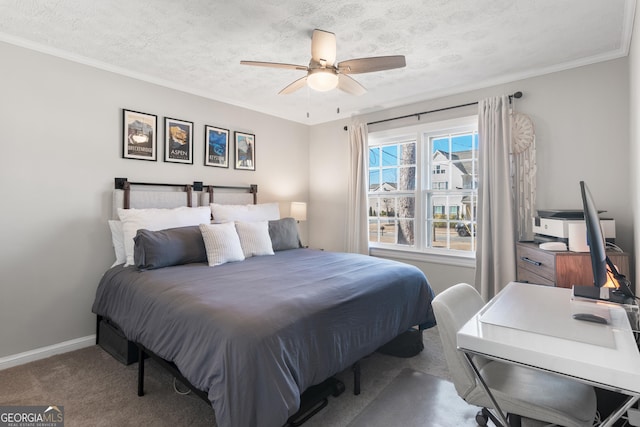 bedroom featuring a textured ceiling, ceiling fan, carpet, and baseboards